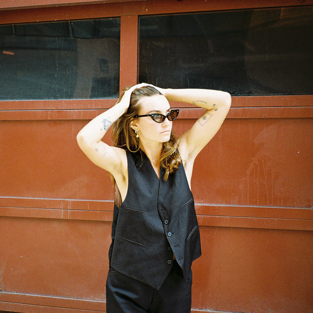Model wearing Leoide designer sunglasses